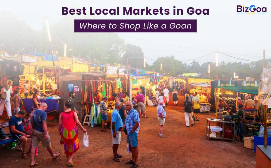 Colorful street stalls at Anjuna Flea Market in Goa selling spices, jewelry, clothes, and souvenirs